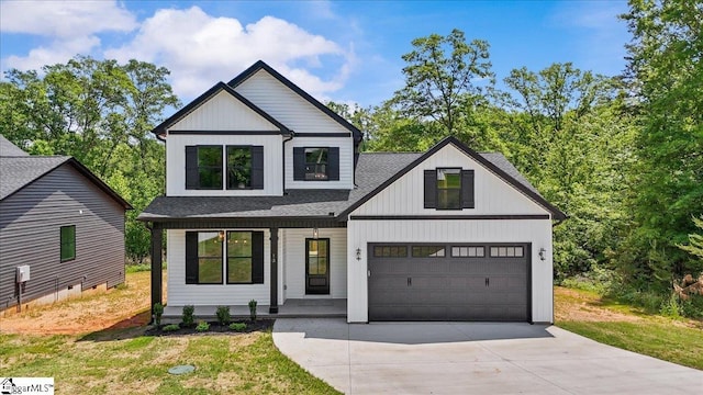 13 Lyman Lake Rd, Lyman, SC 29365 - modern farmhouse style home with covered porch, driveway, roof with shingles, a garage, and a front lawn