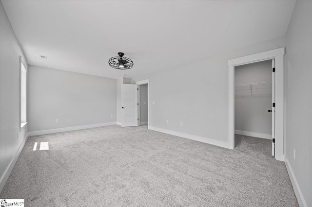13 Lyman Lake Rd, Lyman, SC 29365 - unfurnished bedroom with carpet floors, baseboards, and a spacious closet