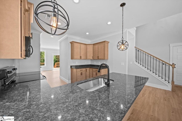 13 Lyman Lake Rd, Lyman, SC 29365 - kitchen featuring crown molding, black electric range oven, a chandelier, a sink, and dark stone countertops