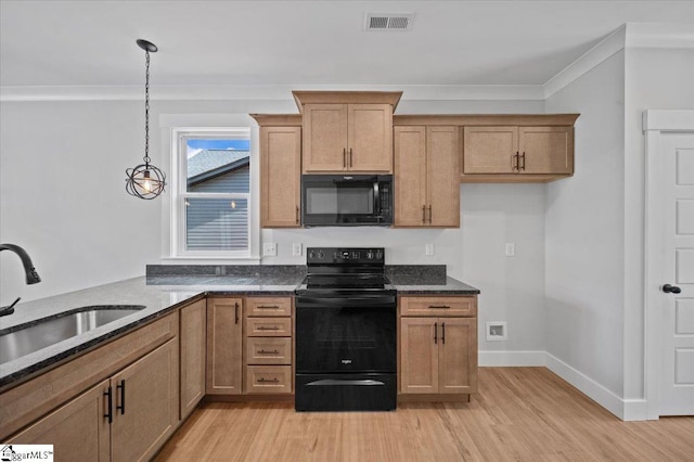 13 Lyman Lake Rd, Lyman, SC 29365 - kitchen featuring visible vents, a sink, light wood-style flooring, black appliances, and hanging light fixtures