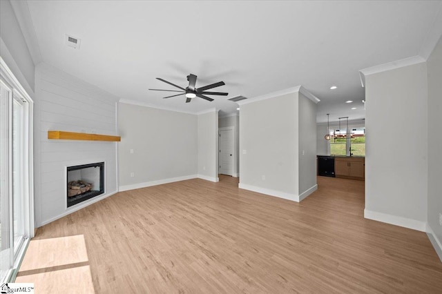 13 Lyman Lake Rd, Lyman, SC 29365 - unfurnished living room featuring visible vents, a ceiling fan, light wood-style flooring, and a fireplace