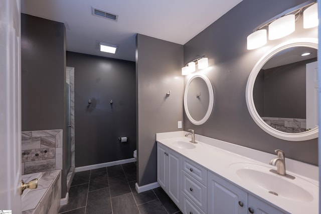 full bathroom featuring a sink, baseboards, a shower with door, and visible vents