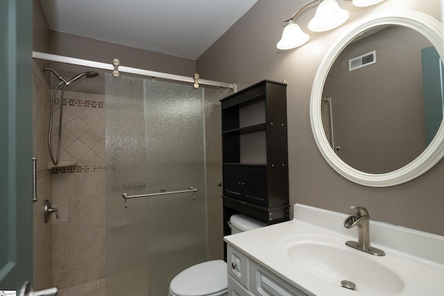 full bathroom with visible vents, vanity, toilet, and a shower stall