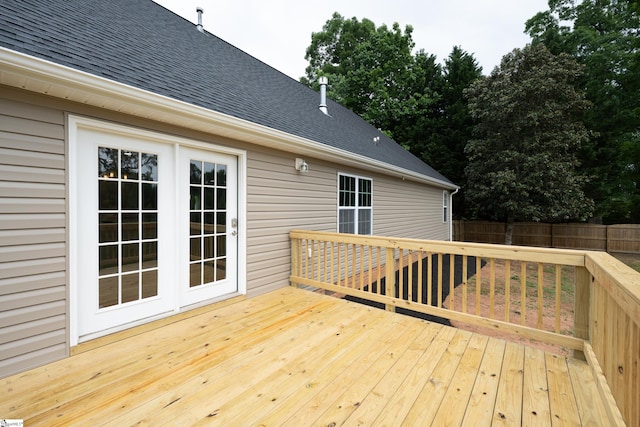 wooden deck featuring fence