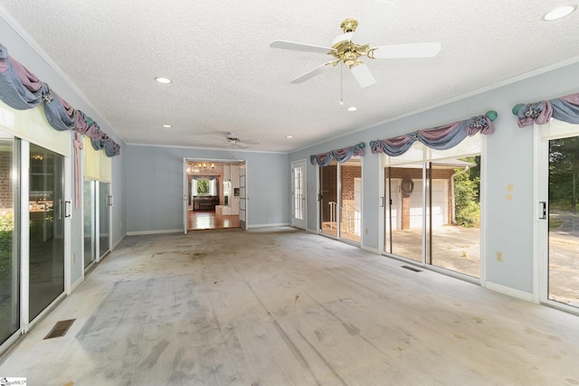 interior space with crown molding, a textured ceiling, and a healthy amount of sunlight