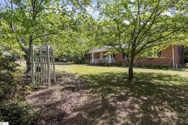 view of yard featuring a porch