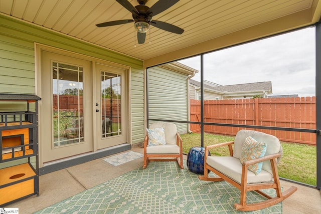 sunroom / solarium with ceiling fan