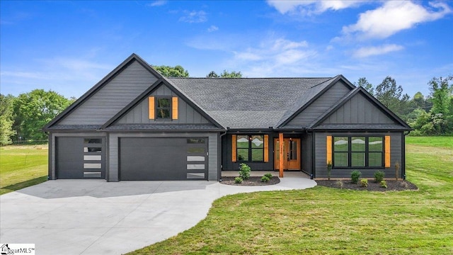 view of front of house featuring a garage, board and batten siding, a front yard, and concrete driveway