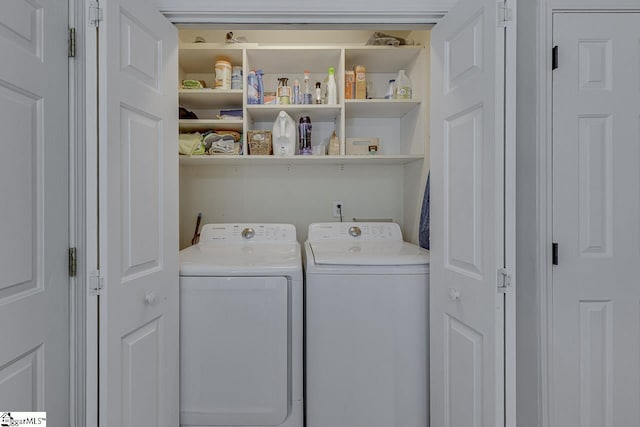 laundry room with laundry area and separate washer and dryer