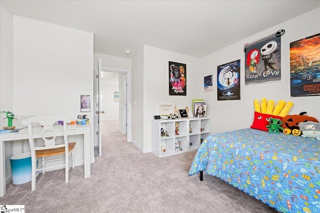 bedroom featuring baseboards and carpet flooring