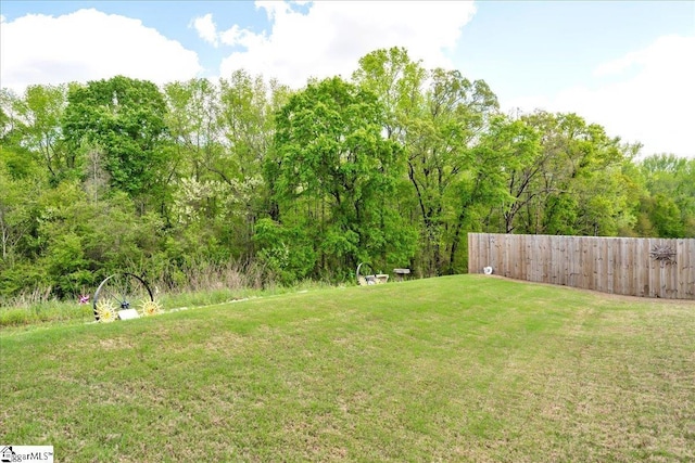 view of yard with fence
