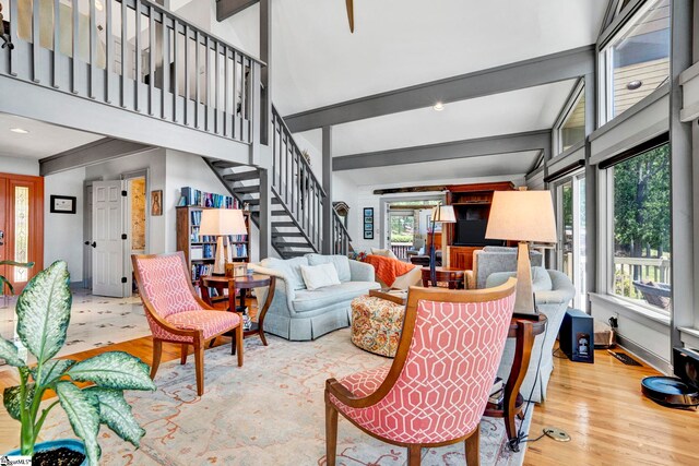 105 Seabright Cir, Cross Hill, SC 39332 - living room with a high ceiling, beamed ceiling, stairs, and wood finished floors