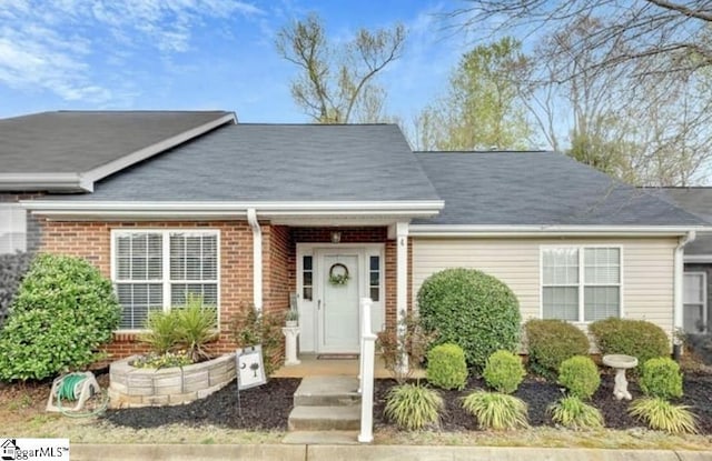 4 Creekbend Ct, Simpsonville, SC 29681 - view of front facade featuring brick siding and roof with shingles