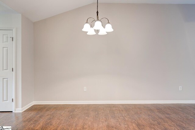 4 Creekbend Ct, Simpsonville, SC 29681 - empty room featuring baseboards, lofted ceiling, wood finished floors, and a chandelier