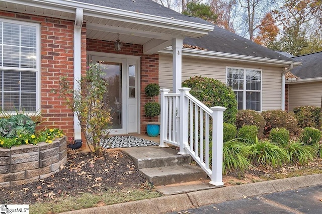 4 Creekbend Ct, Simpsonville, SC 29681 - view of exterior entry with brick siding and a shingled roof