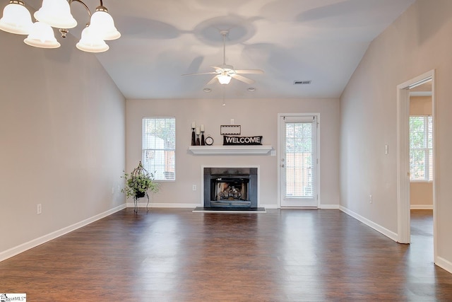 4 Creekbend Ct, Simpsonville, SC 29681 - unfurnished living room featuring a fireplace with raised hearth, dark wood finished floors, ceiling fan with notable chandelier, lofted ceiling, and visible vents