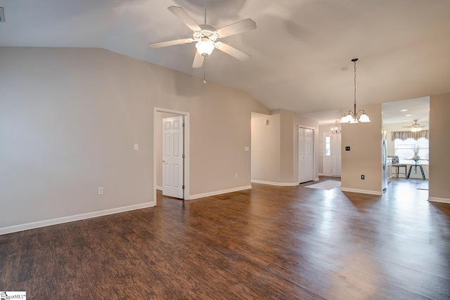 4 Creekbend Ct, Simpsonville, SC 29681 - unfurnished living room featuring dark wood-style flooring, baseboards, vaulted ceiling, and ceiling fan with notable chandelier