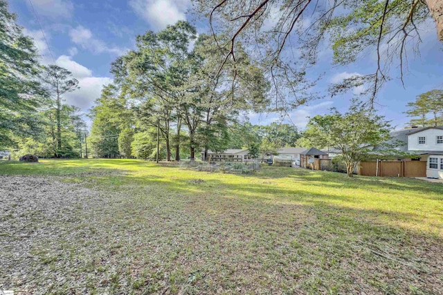 view of yard with fence