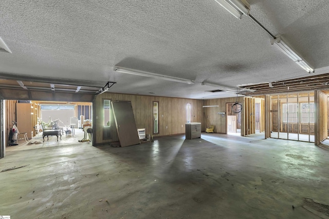 garage with wood walls