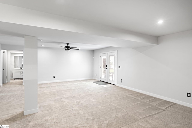 interior space with recessed lighting, baseboards, light carpet, and a ceiling fan