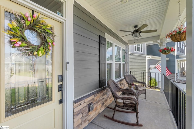 exterior space featuring a ceiling fan and a porch