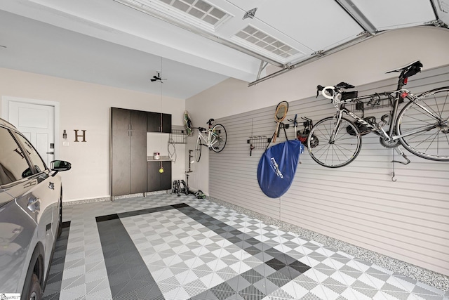 garage with baseboards