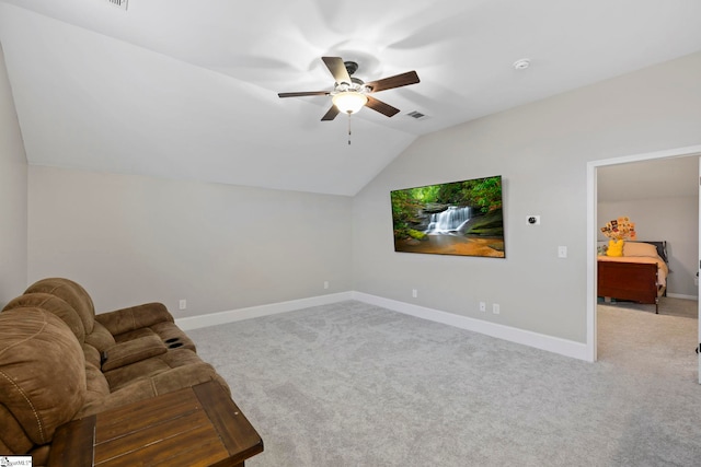 unfurnished living room with visible vents, a ceiling fan, lofted ceiling, and carpet flooring