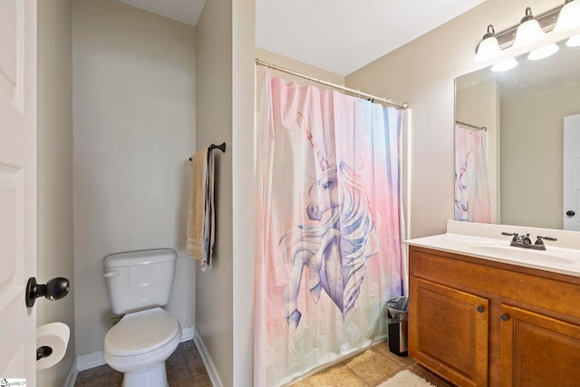 full bathroom with vanity, baseboards, toilet, and a shower with curtain