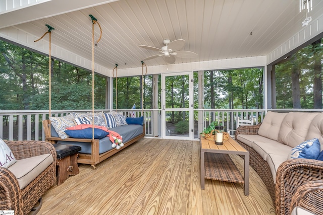 sunroom with an outdoor hangout area and ceiling fan