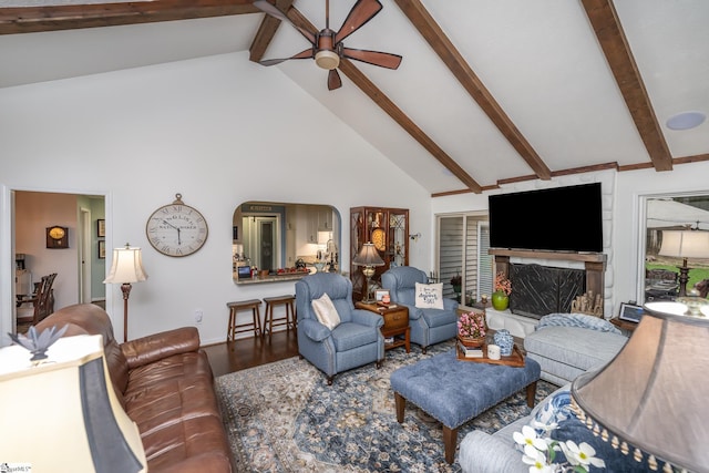 living room featuring beam ceiling, wood finished floors, ceiling fan, high vaulted ceiling, and a premium fireplace