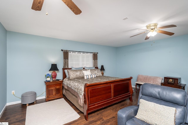 bedroom featuring baseboards, dark wood-style floors, and ceiling fan