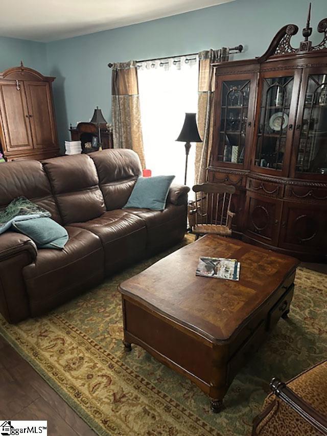 living area featuring wood finished floors