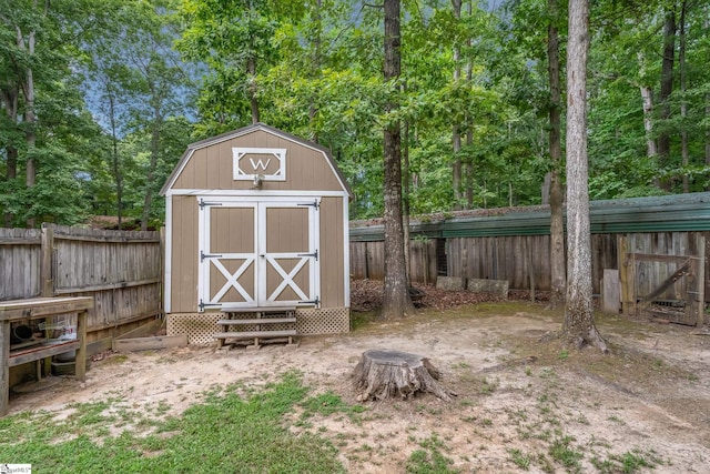 view of shed featuring a fenced backyard