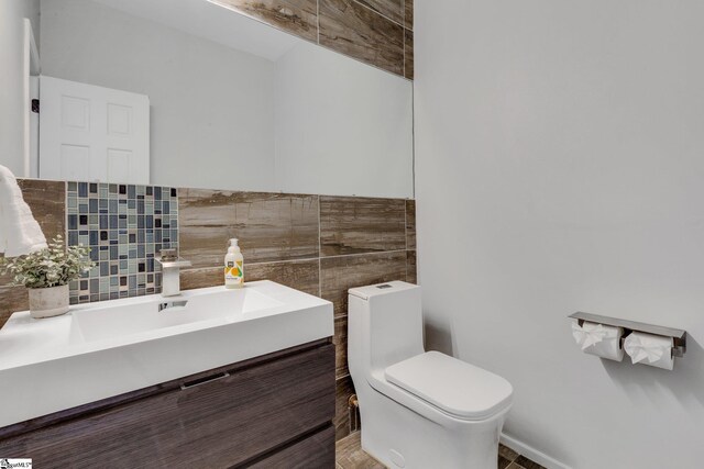 205 Rosebank Way, Greenville, SC 29615 - half bathroom featuring toilet, tile walls, and vanity