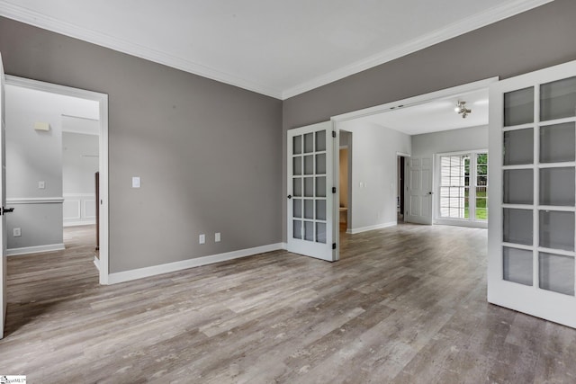 205 Rosebank Way, Greenville, SC 29615 - unfurnished room with crown molding, baseboards, french doors, and wood finished floors