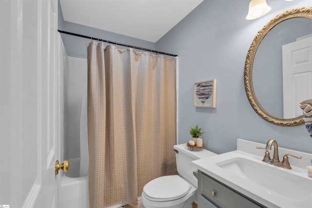 full bath with vanity, toilet, and shower / bath combination with curtain