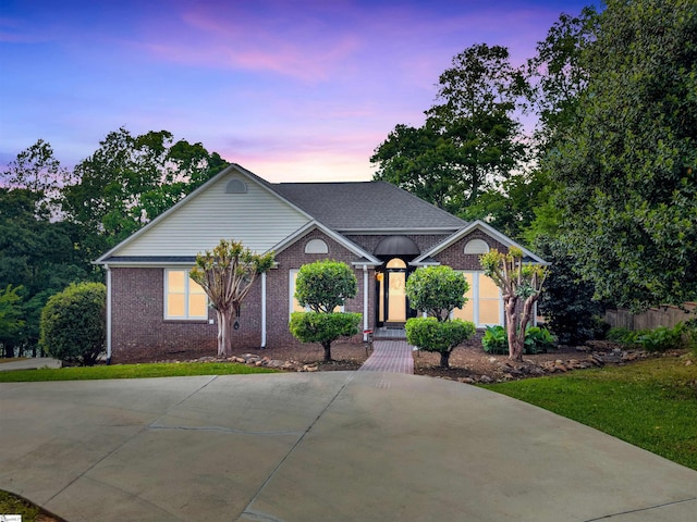ranch-style house with brick siding