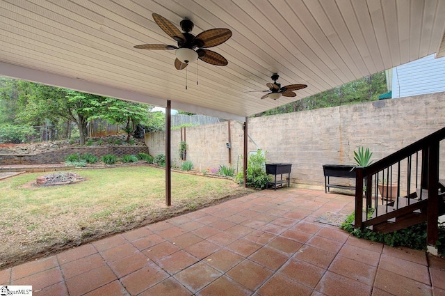 602 Habersham Ln, Easley, SC 29642 - view of patio / terrace with a fenced backyard, ceiling fan, and an outdoor fire pit