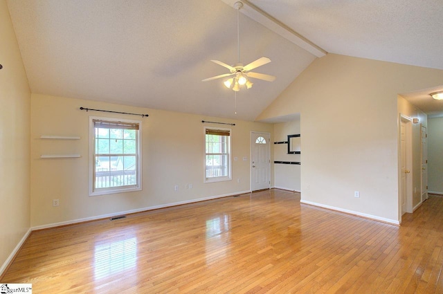 602 Habersham Ln, Easley, SC 29642 - empty room with a ceiling fan, light wood-type flooring, baseboards, high vaulted ceiling, and beamed ceiling
