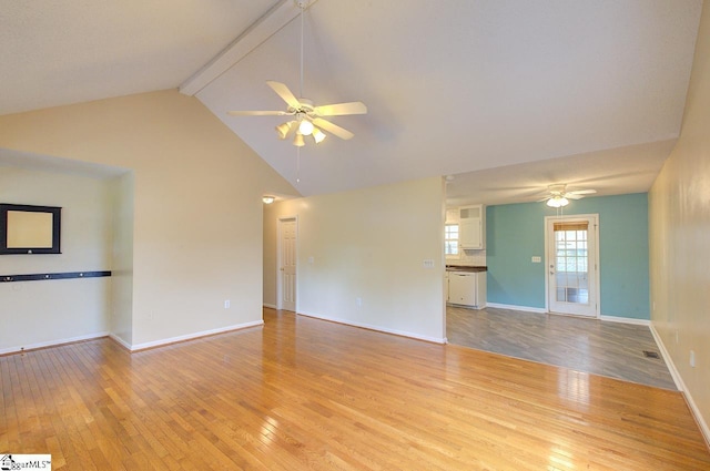 602 Habersham Ln, Easley, SC 29642 - unfurnished living room featuring light wood-style floors, ceiling fan, beam ceiling, and high vaulted ceiling