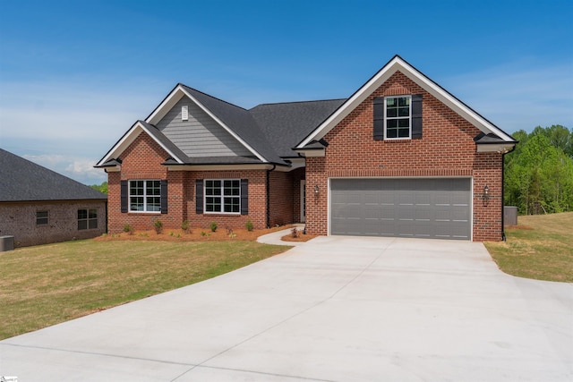 241 Carriage Gate Dr, Wellford, SC 29385 - craftsman-style house with brick siding, a front lawn, and driveway