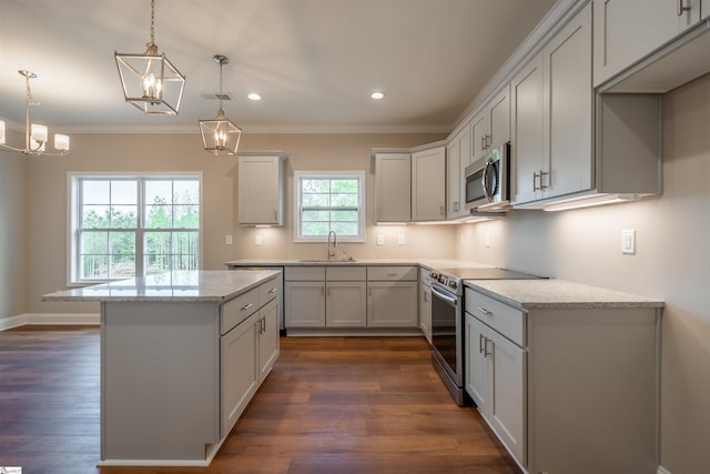 241 Carriage Gate Dr, Wellford, SC 29385 - kitchen with visible vents, appliances with stainless steel finishes, a sink, a notable chandelier, and ornamental molding