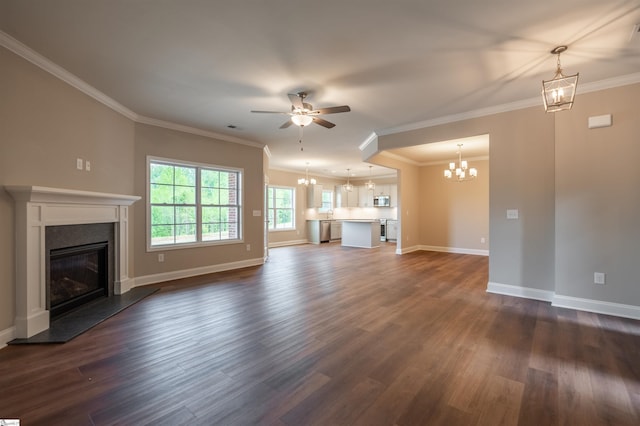 241 Carriage Gate Dr, Wellford, SC 29385 - unfurnished living room with baseboards, dark wood finished floors, ceiling fan with notable chandelier, and a high end fireplace