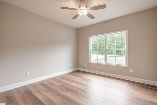 241 Carriage Gate Dr, Wellford, SC 29385 - unfurnished room featuring baseboards, ceiling fan, and light wood-type flooring