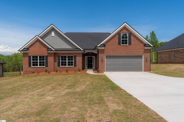 241 Carriage Gate Dr, Wellford, SC 29385 - view of front of property featuring concrete driveway, a front lawn, and brick siding