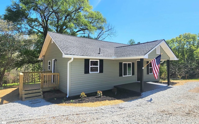 509 Allgood Bridge Rd, Pickens, SC 29671 - view of home's exterior with a wooden deck and roof with shingles