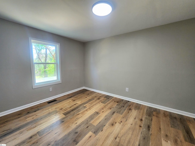 509 Allgood Bridge Rd, Pickens, SC 29671 - unfurnished room featuring baseboards, visible vents, and wood finished floors