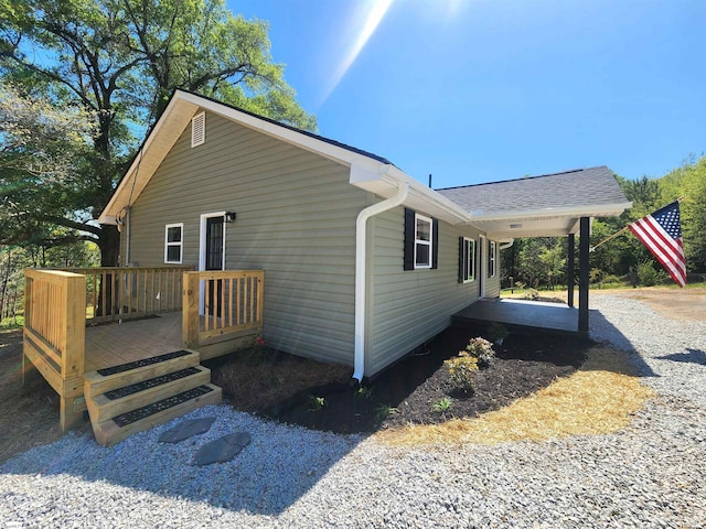509 Allgood Bridge Rd, Pickens, SC 29671 - view of side of property featuring a shingled roof and a wooden deck