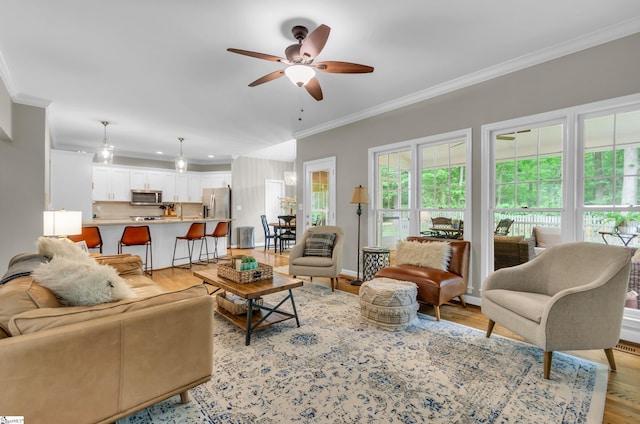 4 Barley Mill Dr, Greer, SC 29651 - living room with crown molding, a ceiling fan, light wood finished floors, and recessed lighting