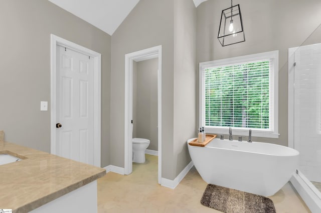 4 Barley Mill Dr, Greer, SC 29651 - full bath featuring a freestanding tub, baseboards, vanity, toilet, and lofted ceiling